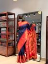 Kanjivaram navy blue with red border